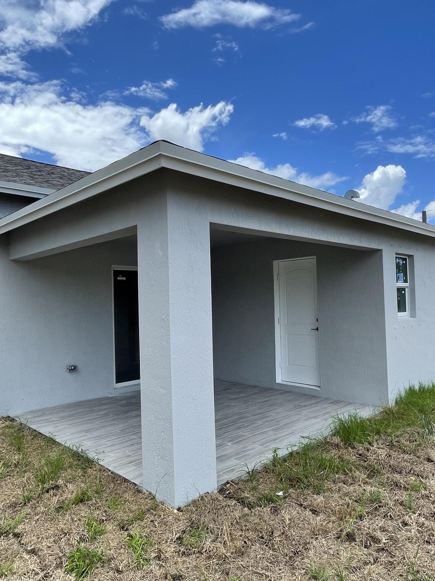 310 Southwest Becker Road Port St. Lucie, FL 34953 - Photo 15 of 15 Sunrise Model Back Porch