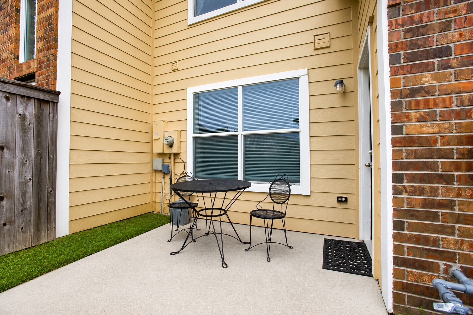 1618 Grable Cove Lane Spring, TX 77379 - Photo 28 of 32 Low-maintenance backyard with a charming patio space designed for quiet mornings, casual gatherings, and peaceful evenings outdoors.