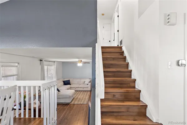 a view of a bathroom with a shower and a sink