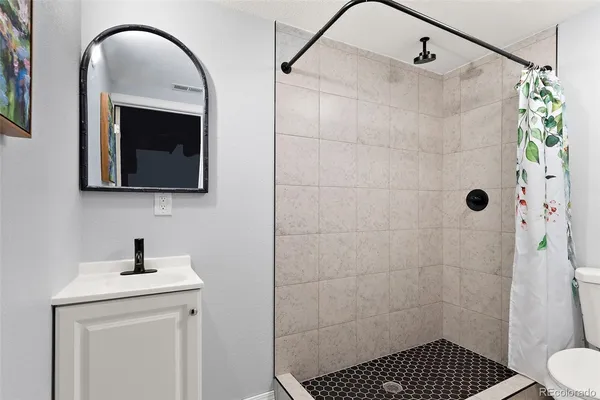 a view of a swimming pool with outdoor seating