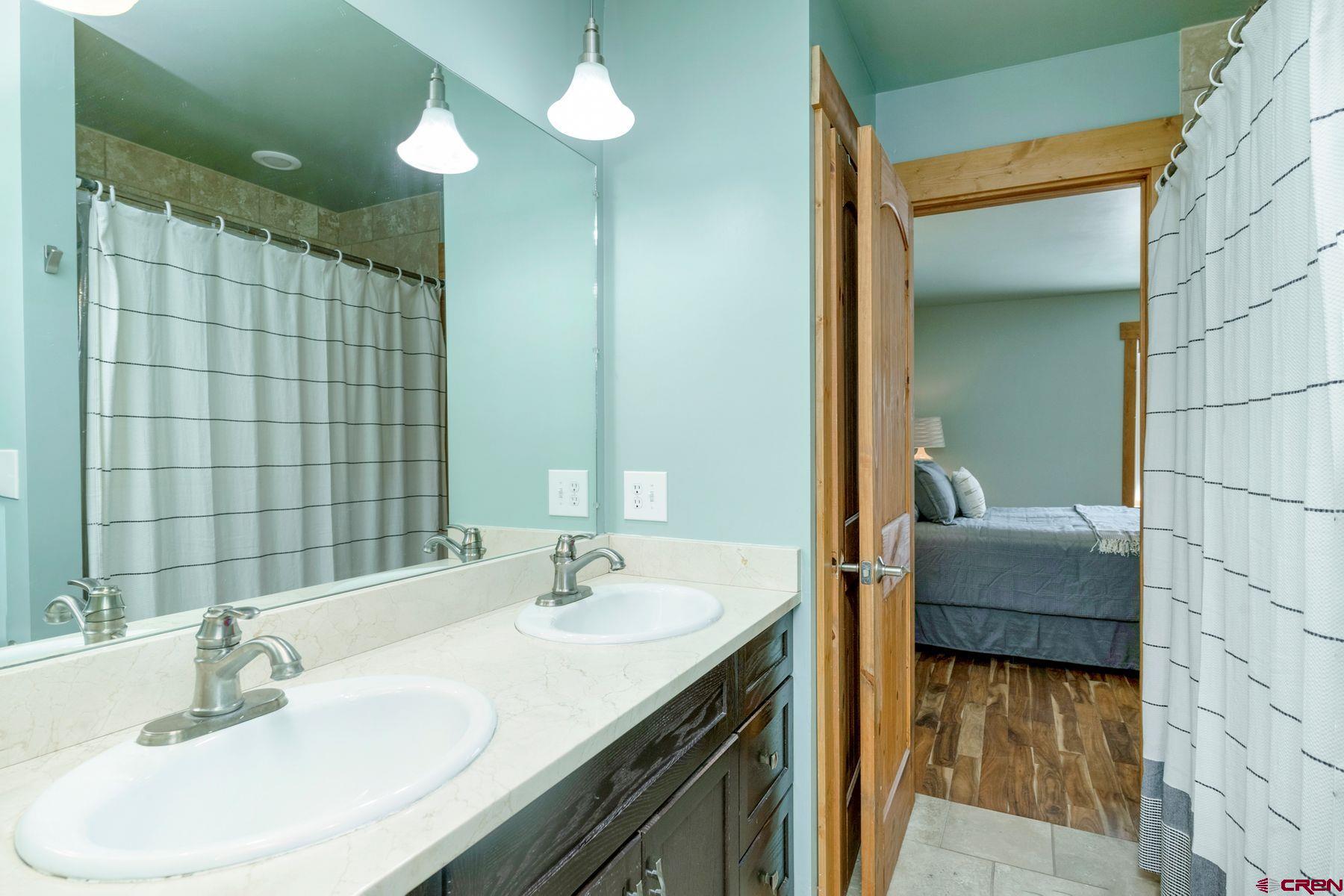 86 Jacquelyn Lane Crested Butte, CO 81224 - Photo 13 of 29 a bathroom with a sink and a mirror