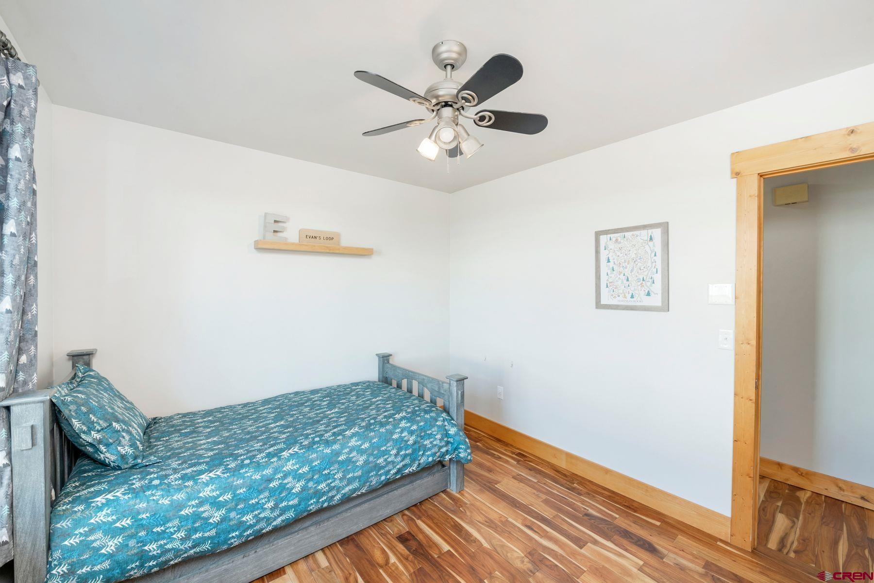 86 Jacquelyn Lane Crested Butte, CO 81224 - Photo 18 of 29 a bedroom with a bed and a window