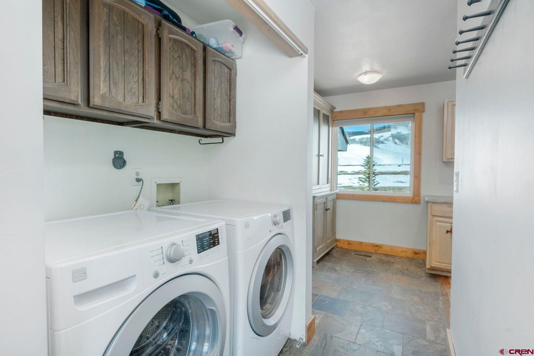 86 Jacquelyn Lane Crested Butte, CO 81224 - Photo 19 of 29 a utility room with dryer and washer