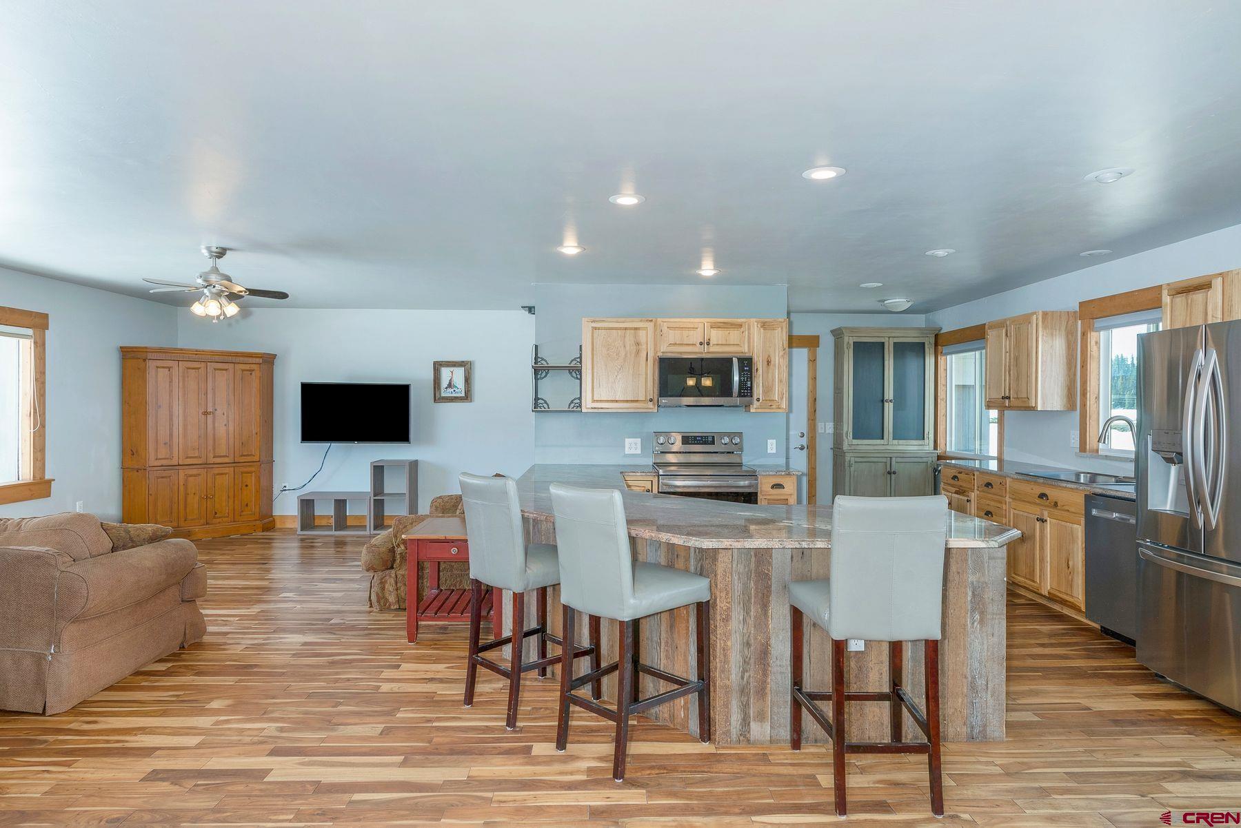 86 Jacquelyn Lane Crested Butte, CO 81224 - Photo 4 of 29 a view of a dining room with furniture window and wooden floor