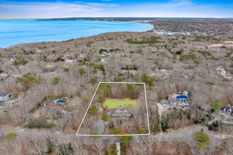 an aerial view of beach and ocean