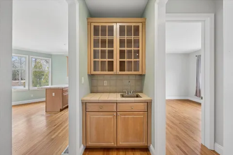 a room with a sink and a window