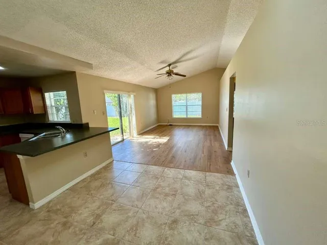 a view of livingroom with wooden floor