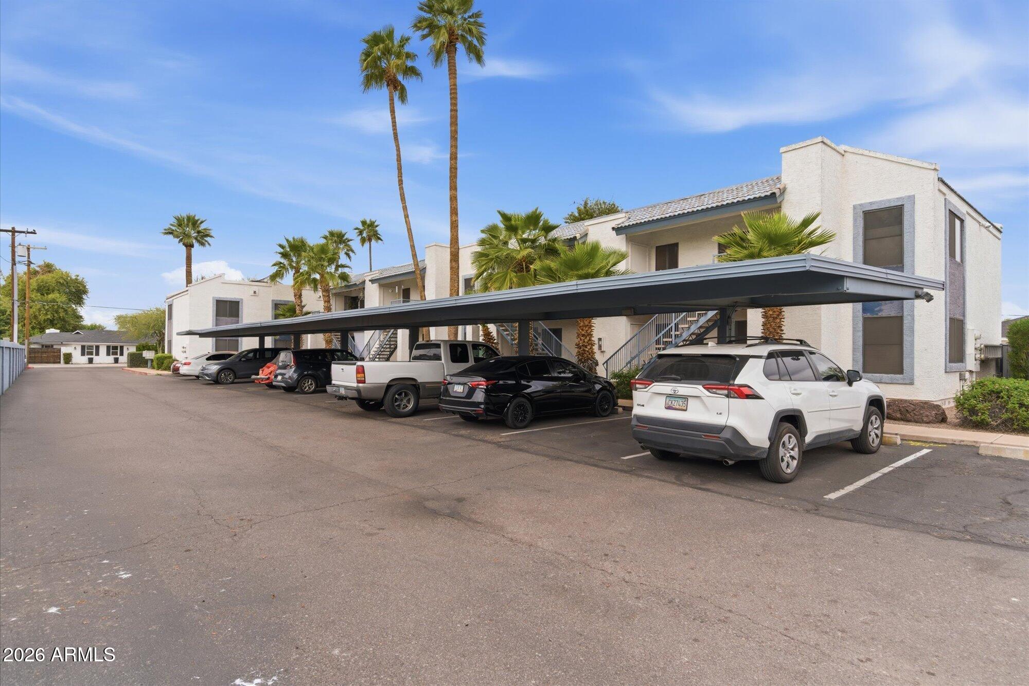 3635 North 37th Street, Unit 10 Phoenix, AZ 85018 - Photo 21 of 26 a car parked in front of a building