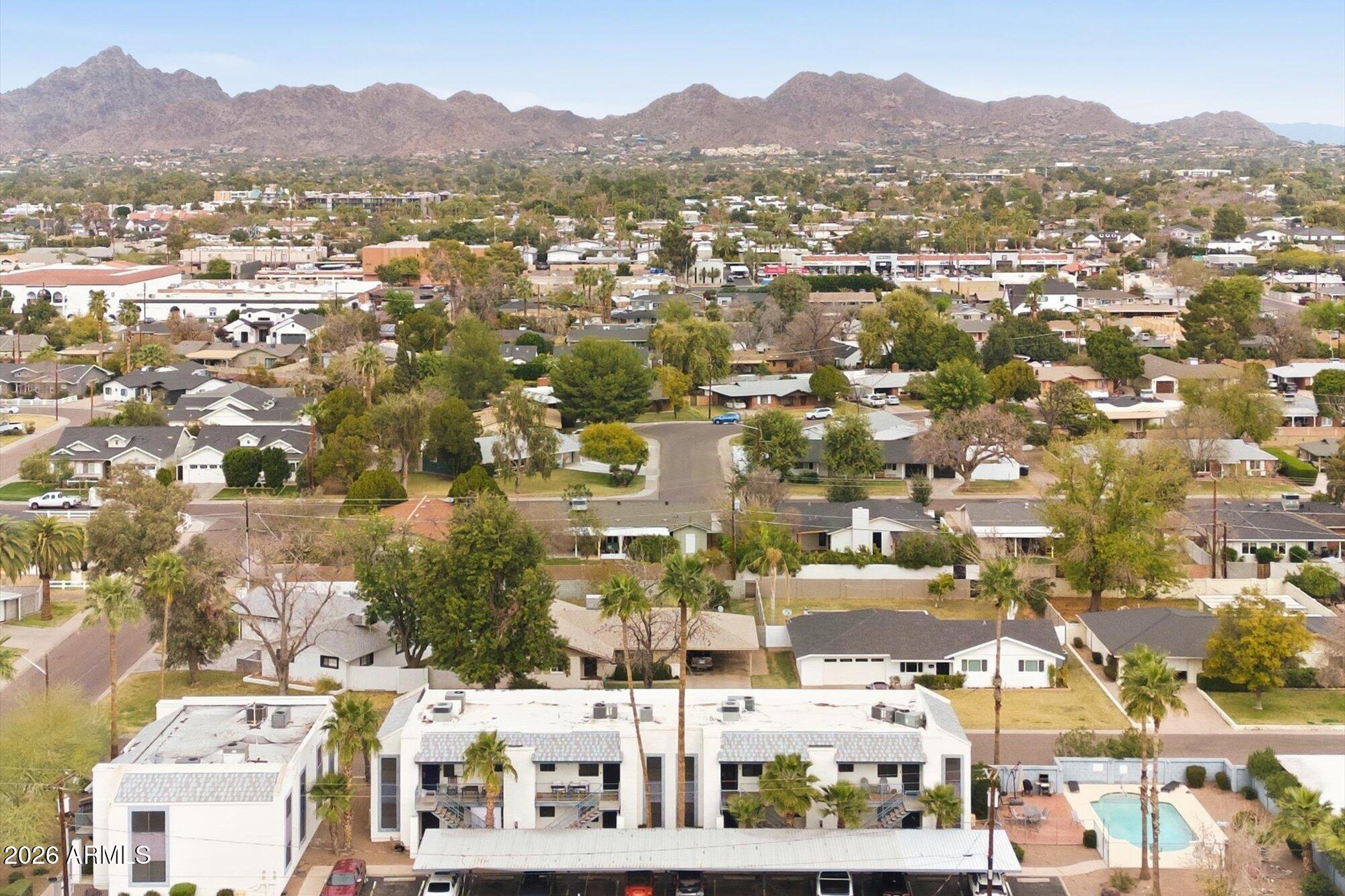 3635 North 37th Street, Unit 10 Phoenix, AZ 85018 - Photo 23 of 26 an aerial view of residential houses and city view