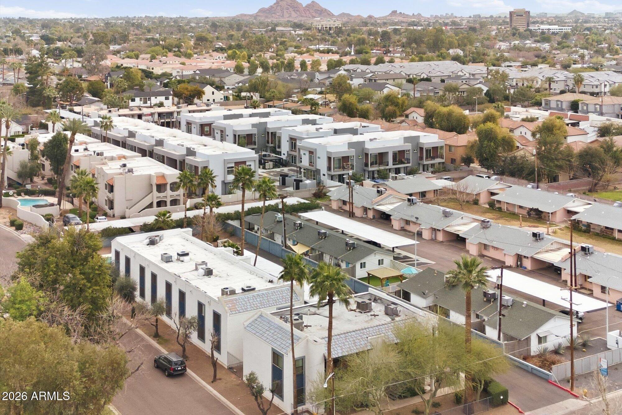 3635 North 37th Street, Unit 10 Phoenix, AZ 85018 - Photo 24 of 26 an aerial view of residential houses with outdoor space