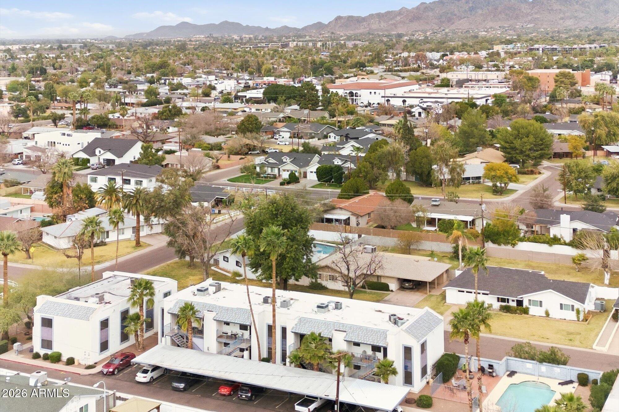 3635 North 37th Street, Unit 10 Phoenix, AZ 85018 - Photo 25 of 26 an aerial view of residential houses with outdoor space