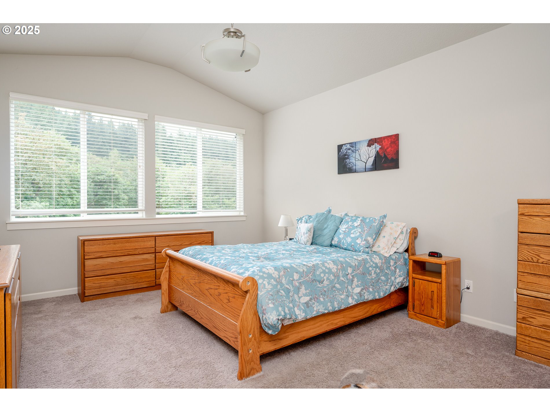 2314 Southwest 43rd Street Gresham, OR 97080 - Photo 19 of 36 a bedroom with a bed and a window
