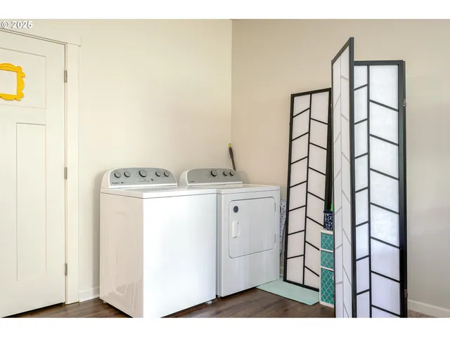 a utility room with dryer and washer