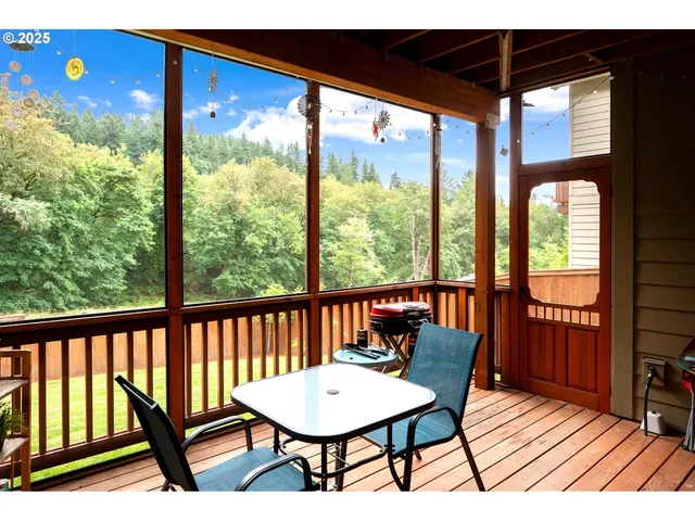 a view of a city from a furniture from a balcony