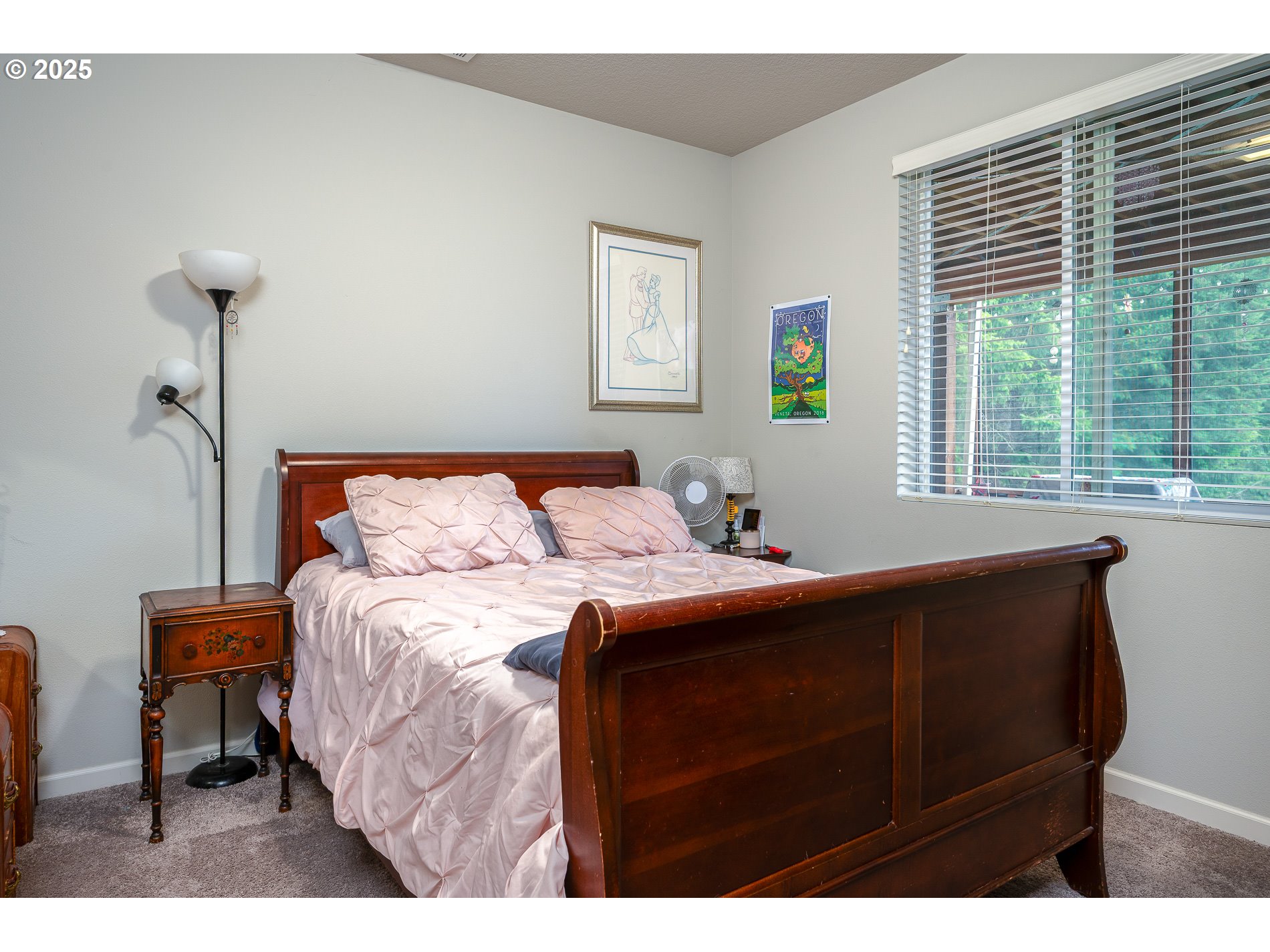2314 Southwest 43rd Street Gresham, OR 97080 - Photo 34 of 36 a bedroom with a bed and a window