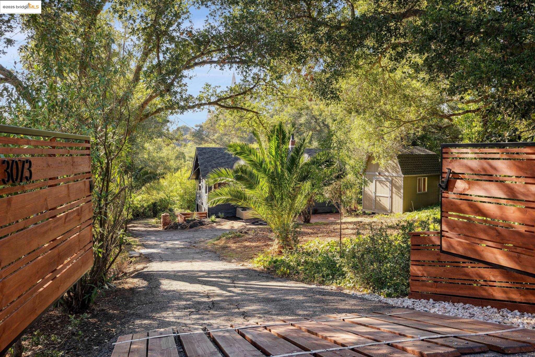 3073 Monterey Boulevard Oakland, CA 94602 - Photo 1 of 1 a backyard of a house with lots of green space