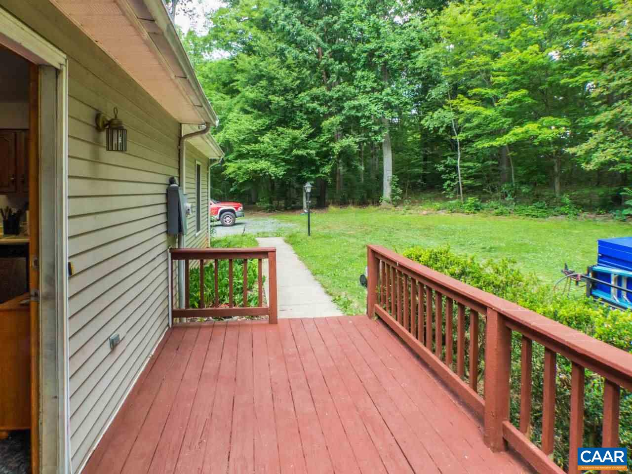 502 Bybees Church Road Palmyra, VA 22963 - Photo 3 of 15 a view of a deck with wooden floor and fence