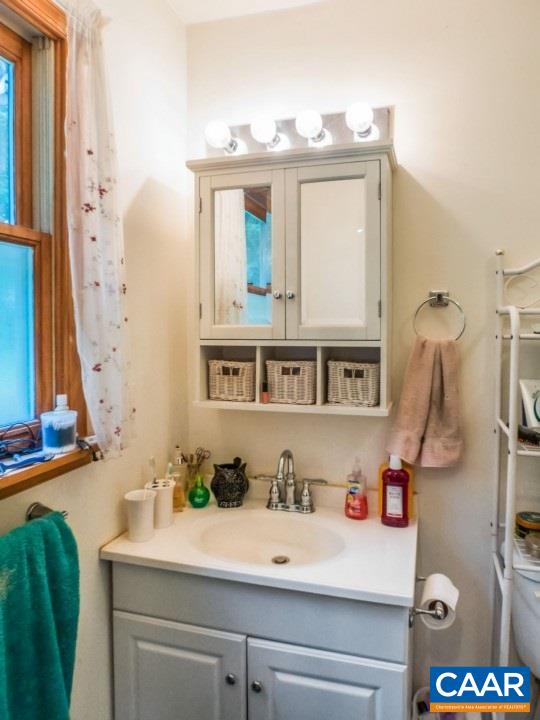 502 Bybees Church Road Palmyra, VA 22963 - Photo 8 of 15 a bathroom with a sink and a mirror
