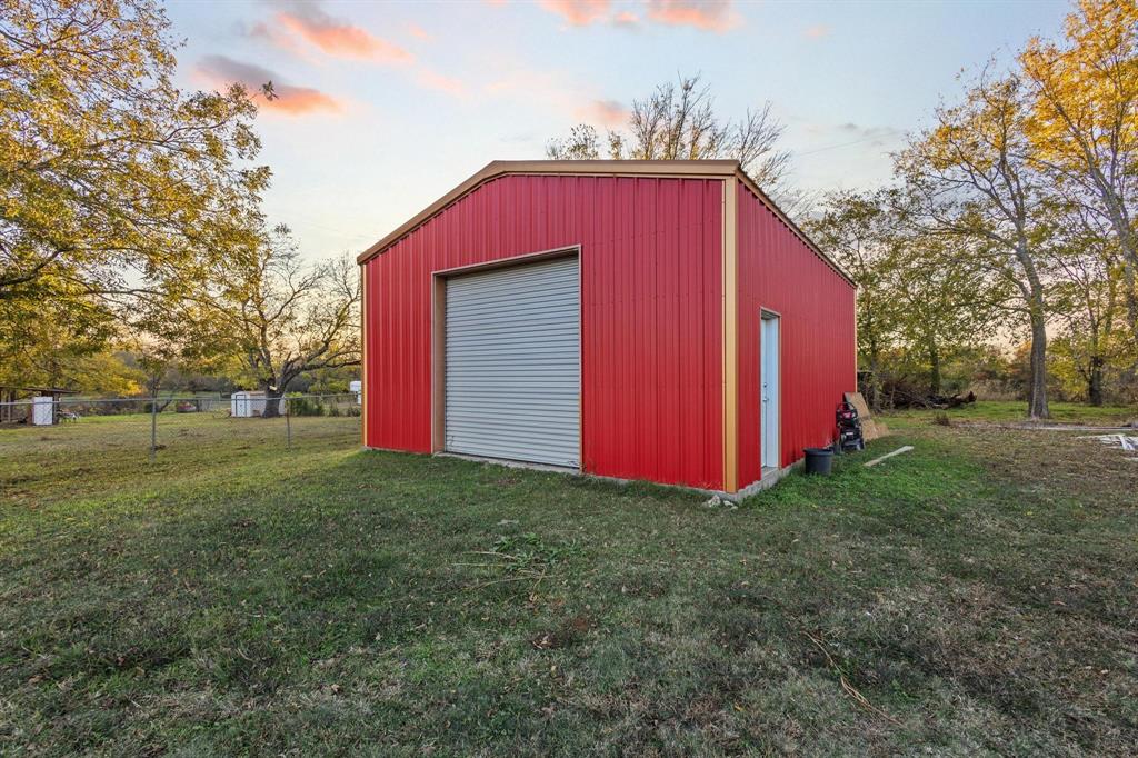 469 Dugan Chapel Road Bells, TX 75414 - Photo 31 of 33 a view of a house with a yard