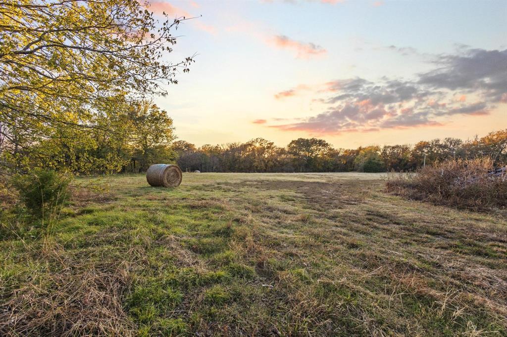 469 Dugan Chapel Road Bells, TX 75414 - Photo 4 of 33 a view of a outdoor space with a lake view