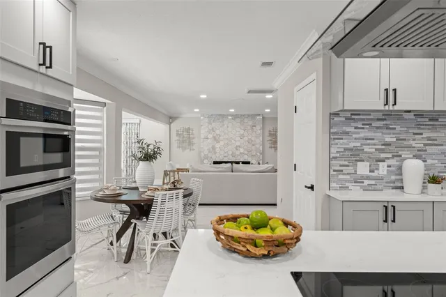 a bathroom with a sink and a window