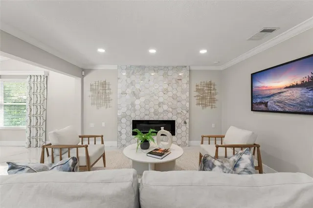 a living room with furniture and a window