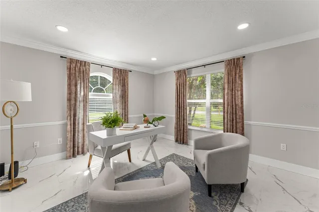 a living room with furniture and a window