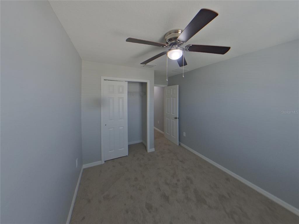Undisclosed Address Riverview, FL 33578 - Photo 11 of 15 a view of an empty room