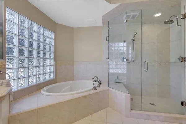 a kitchen with stainless steel appliances granite countertop a stove and cabinets