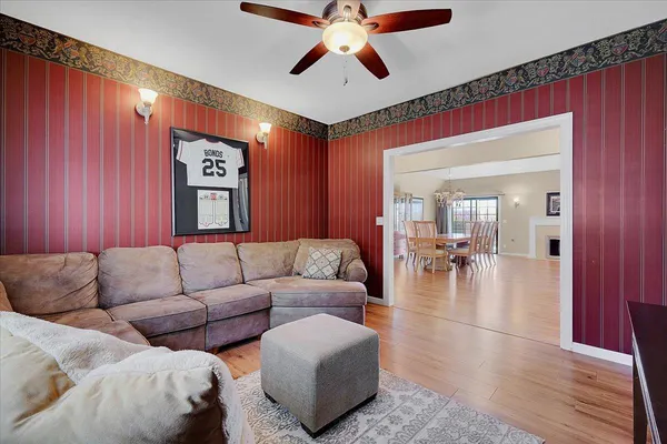 a view of a house with a yard and sitting area