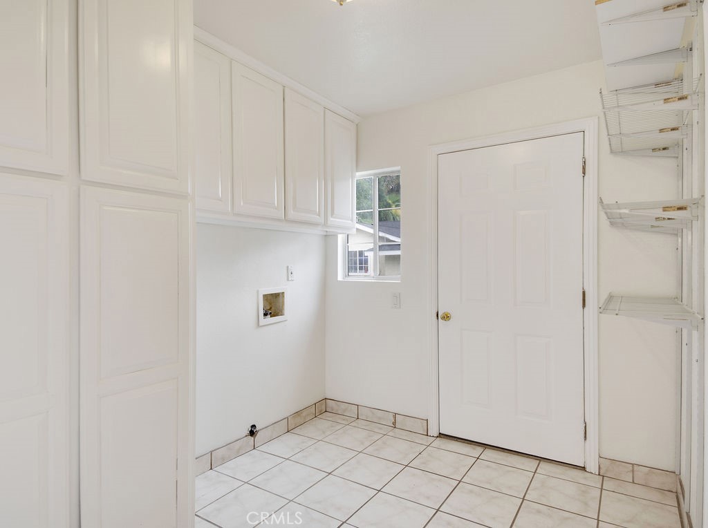 5323 Cogswell Road El Monte, CA 91732 - Photo 16 of 64 Front House laundry room with back exit door