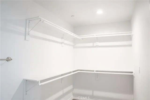 a bathroom with a shower and a window