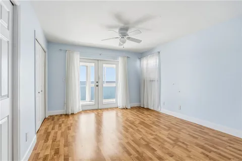 a view of livingroom with kitchen space and window