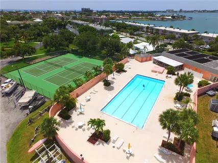 an aerial view of a house with a ocean view