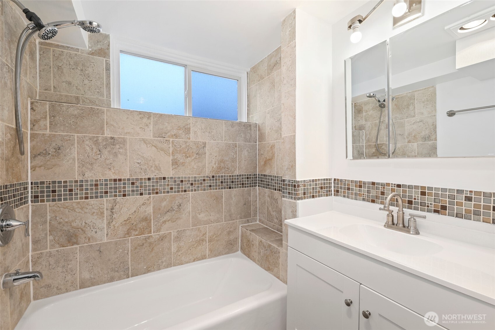 12637 Southeast 161st Street Renton, WA 98058 - Photo 18 of 37 a bathroom with a bathtub and a sink