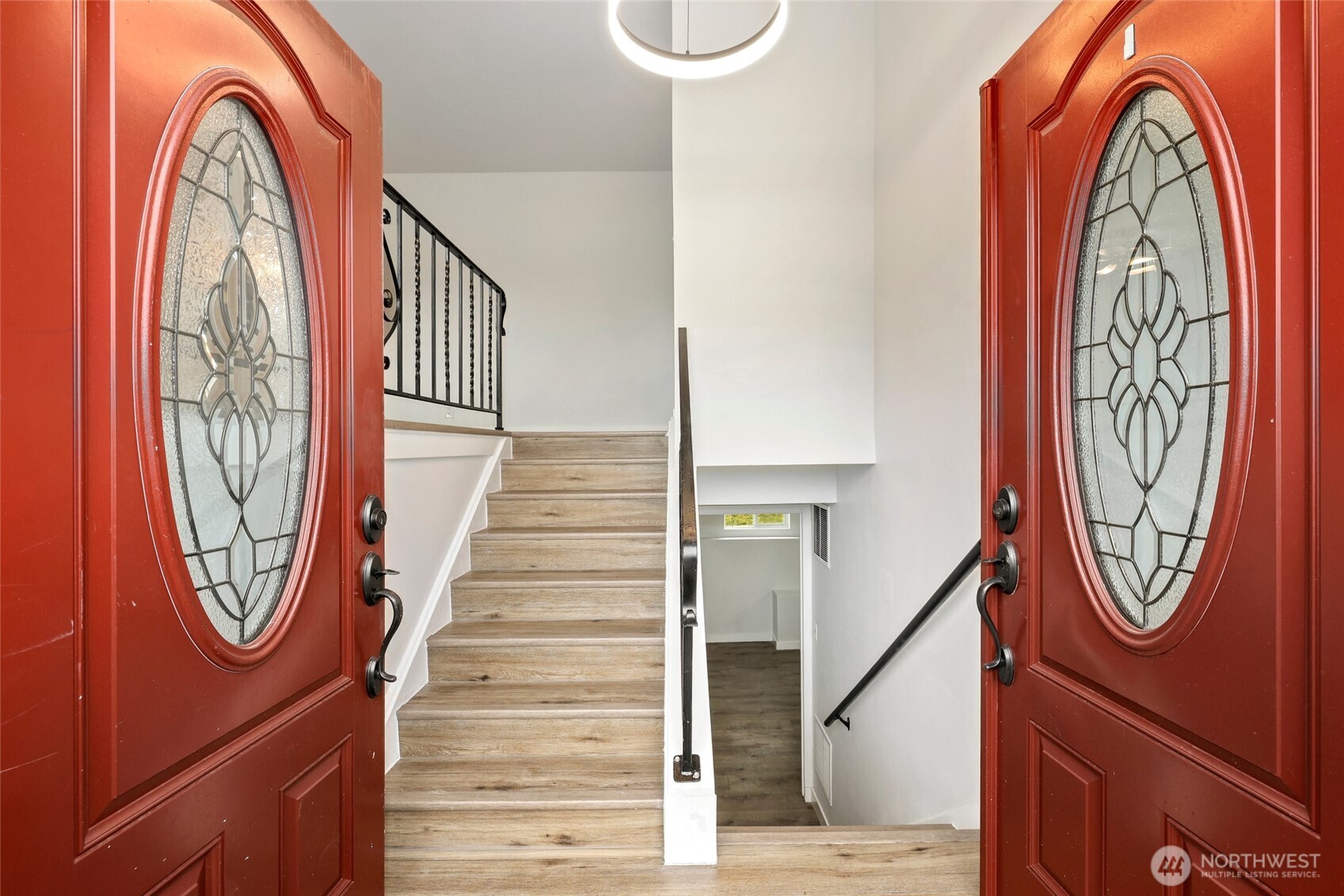 12637 Southeast 161st Street Renton, WA 98058 - Photo 2 of 37 a view of a entryway with wooden door