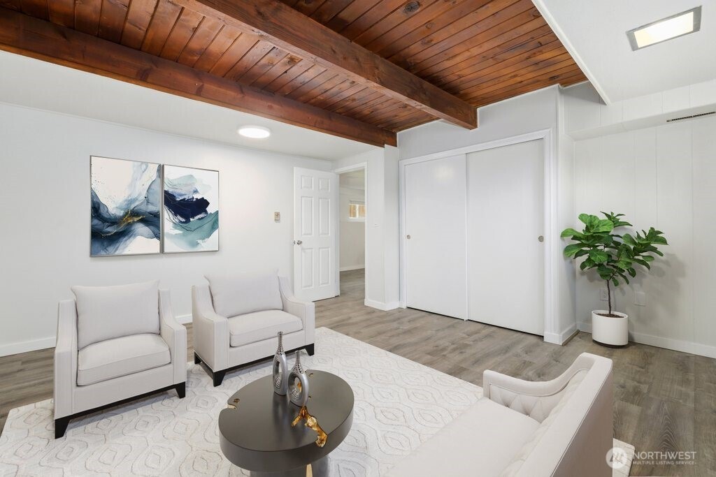 12637 Southeast 161st Street Renton, WA 98058 - Photo 22 of 37 a living room with furniture and a potted plant