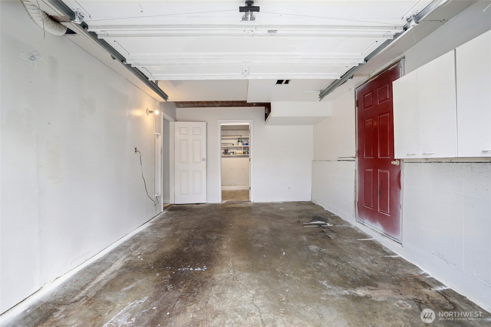 12637 Southeast 161st Street Renton, WA 98058 - Photo 25 of 37 a view of a big room with closet and windows