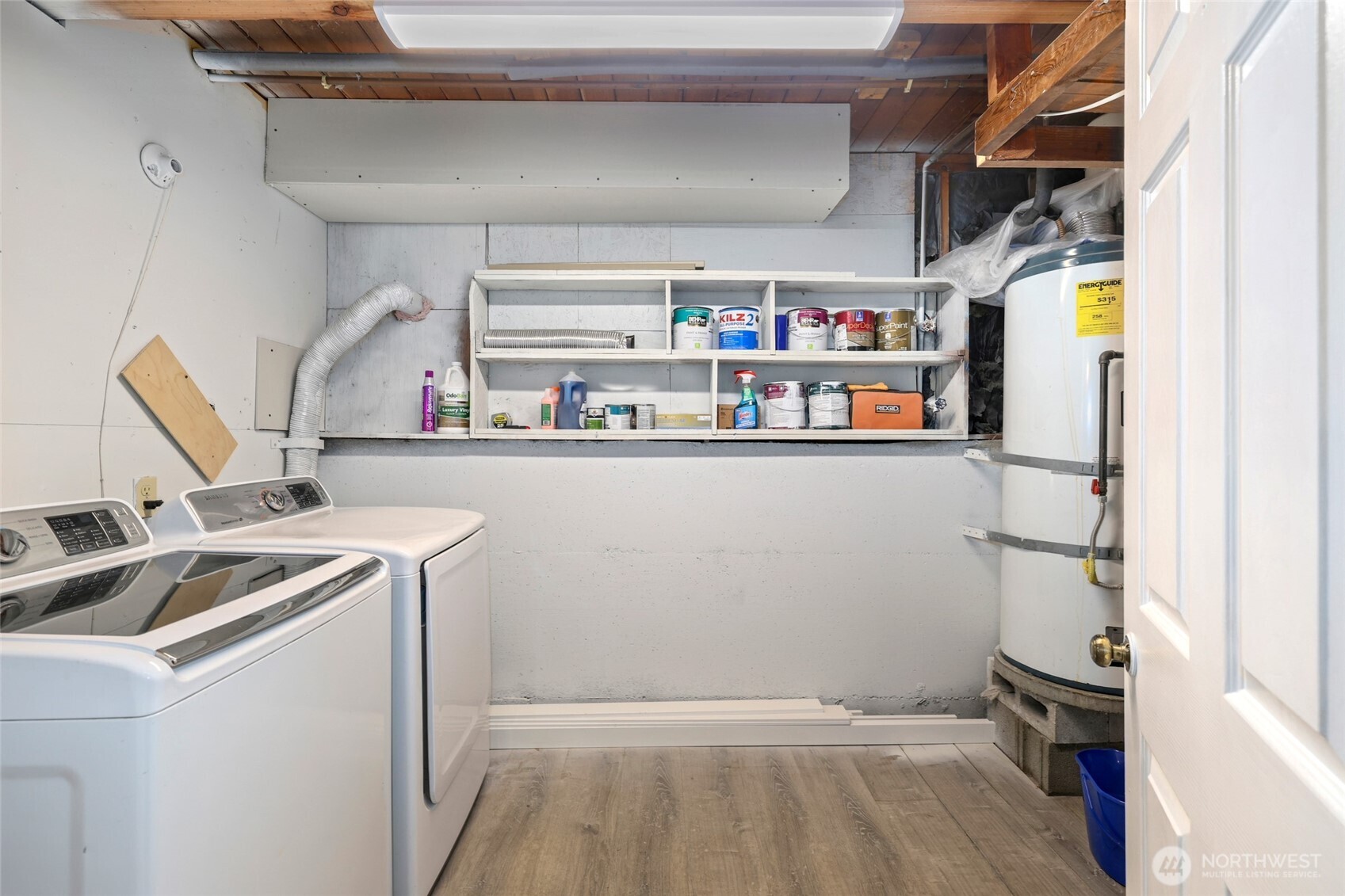 12637 Southeast 161st Street Renton, WA 98058 - Photo 26 of 37 a room with storage and utility