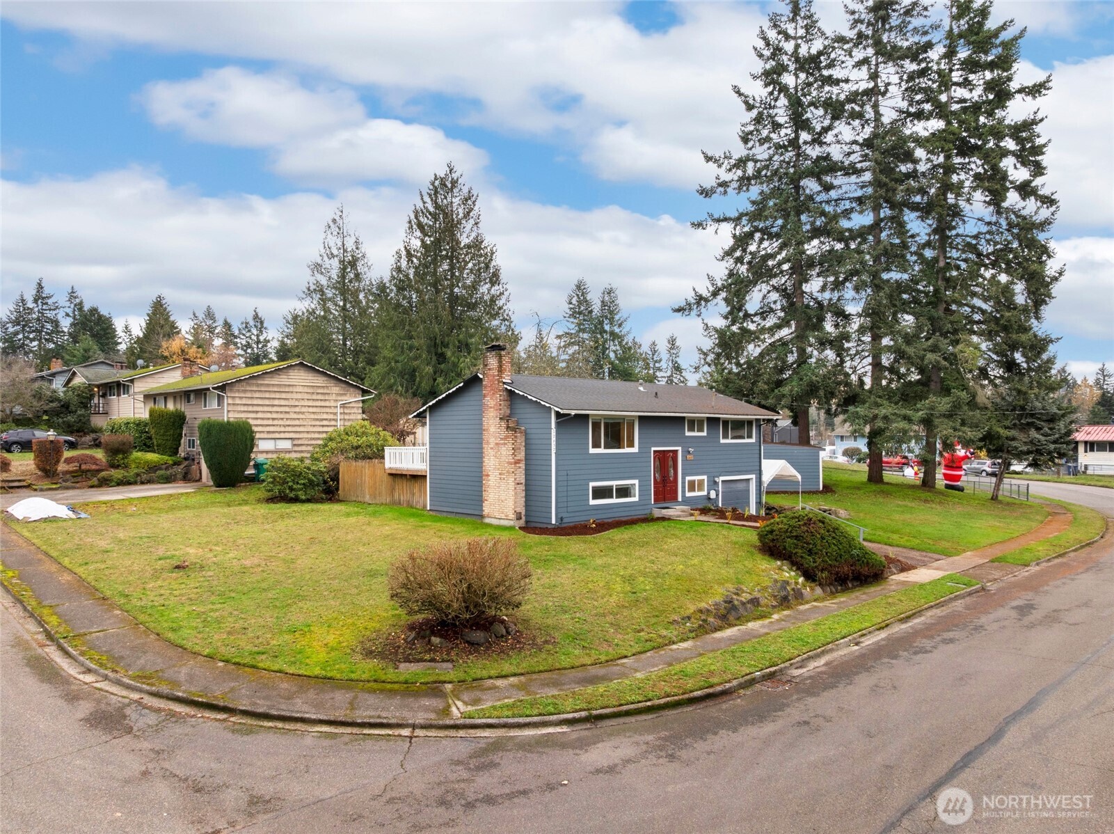 12637 Southeast 161st Street Renton, WA 98058 - Photo 35 of 37 a view of a house with a big yard plants and large trees