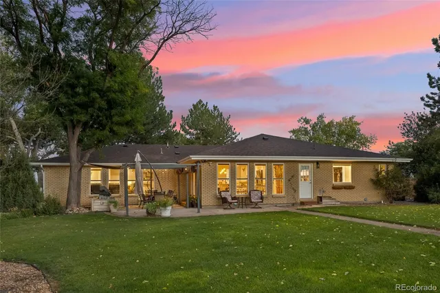 a view of a house with a big yard