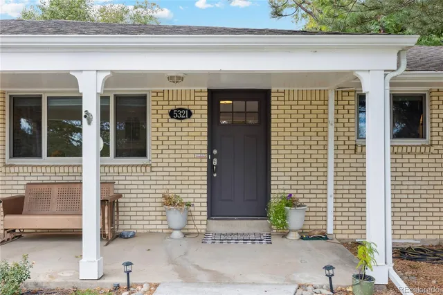 a front view of a house with a garage