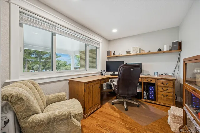 a workspace with furniture and a window