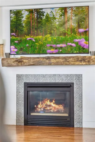 a living room with a fireplace