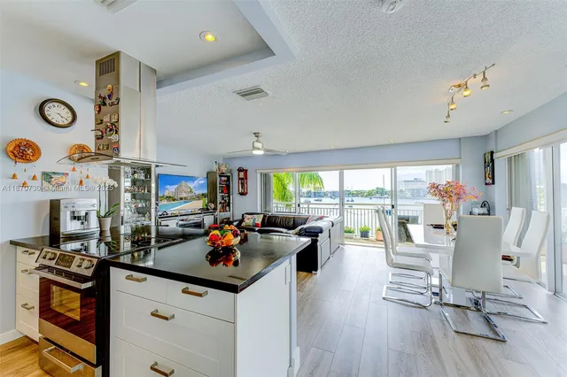 a view of a living room and dining room