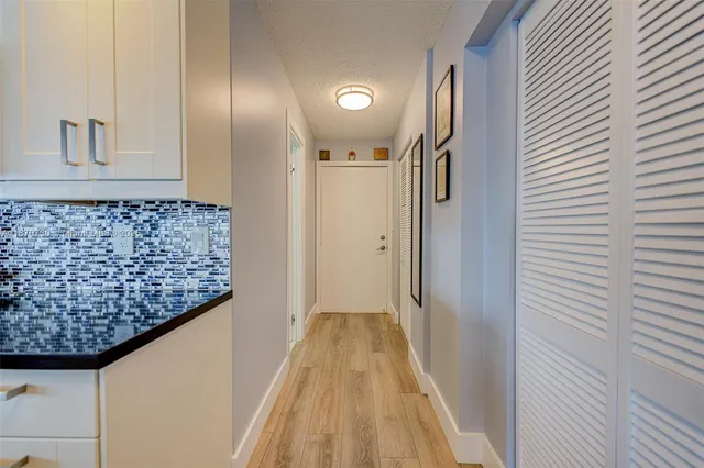 a view of hallway with stairs