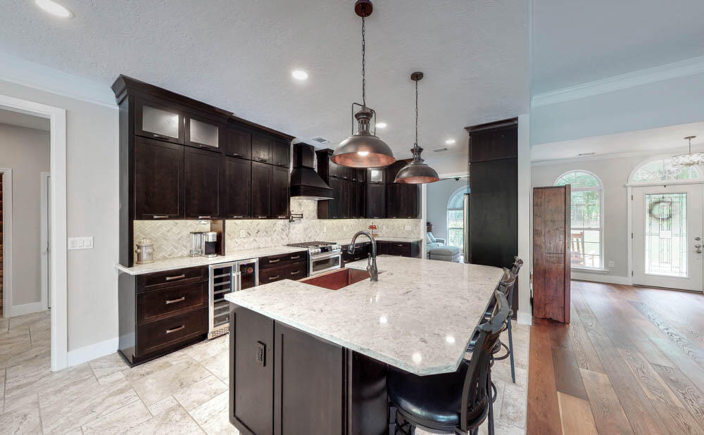 5424 Cemetery Road Grovetown, GA 30813 - Photo 10 of 59 Fabulous completely remodeled kitchen with custom alder cabinets, large island/breakfast bar, quartz countertops, cabinet lighting, and high end appliances!