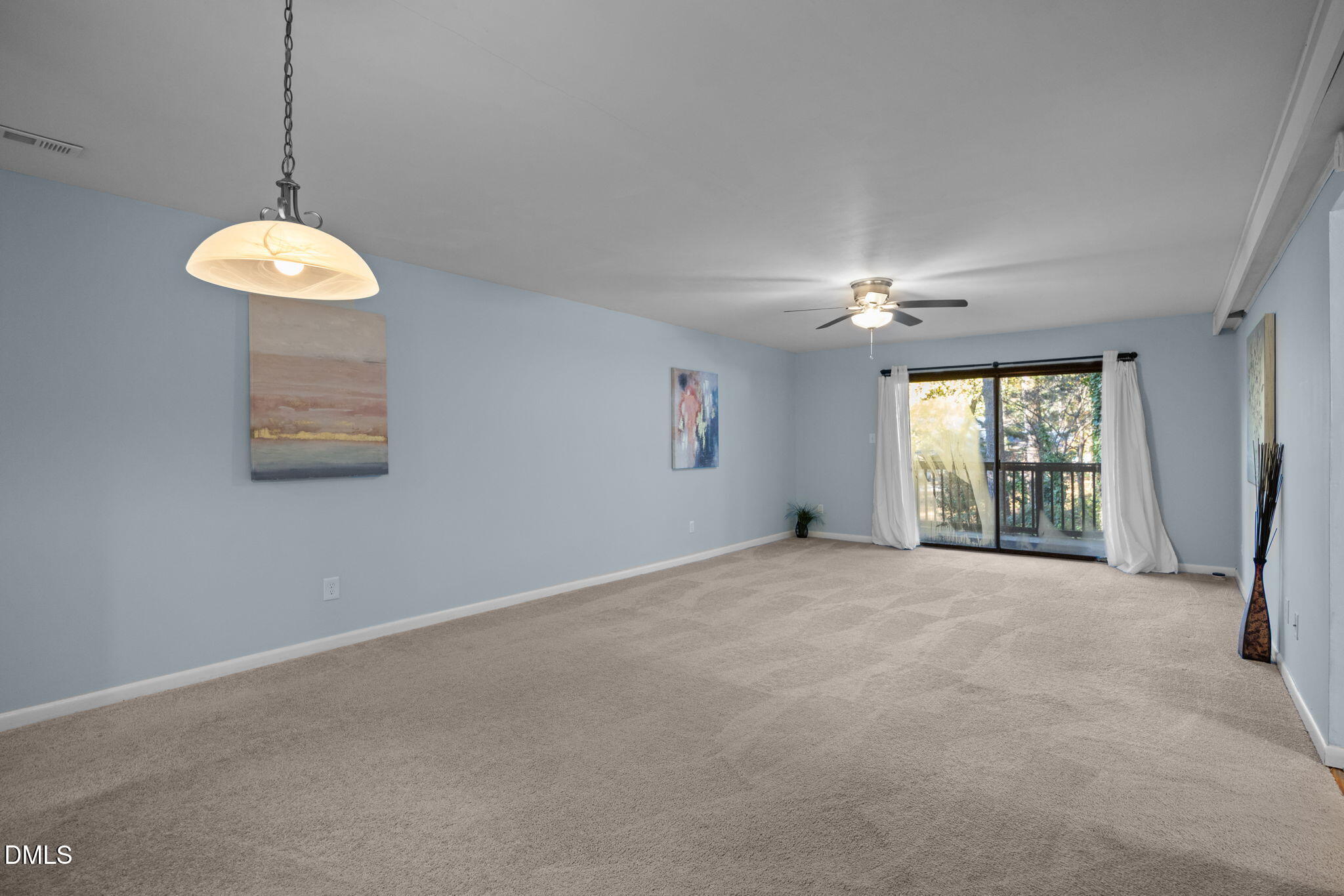 514 Pine Ridge Place Raleigh, NC 27609 - Photo 14 of 38 a view of a livingroom with a window