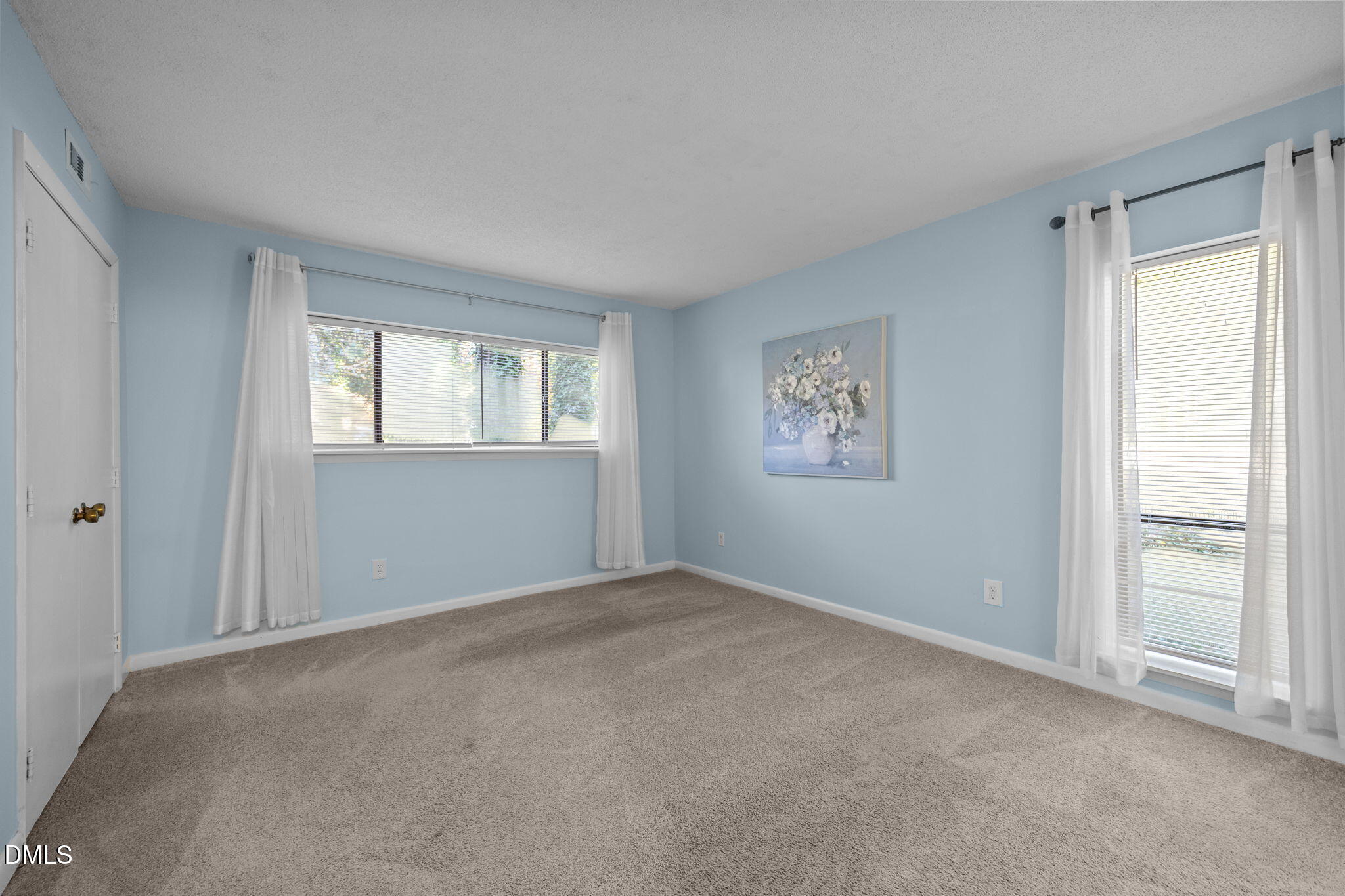 514 Pine Ridge Place Raleigh, NC 27609 - Photo 27 of 38 a view of an empty room with a window