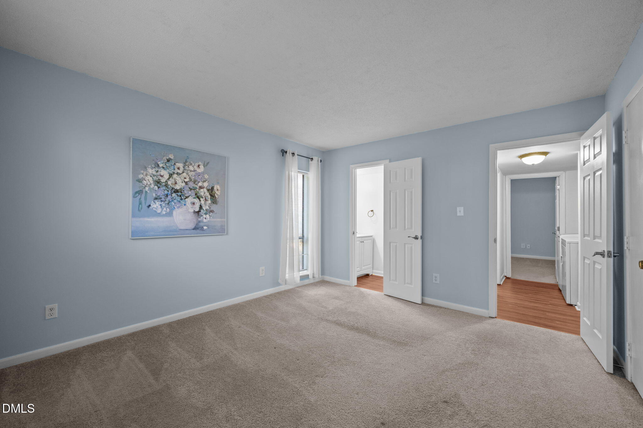 514 Pine Ridge Place Raleigh, NC 27609 - Photo 28 of 38 a view of a big room with closet and windows